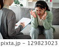 Psychologist doctor examine and listen and talking to patient with depression, mental health concept 129823023