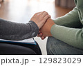 Psychologist or family holding hands to encourage patient with depression, mental health concept 129823029