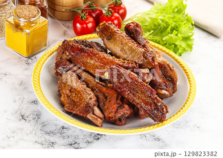 Roasted duck wings with sauce Roasted duck wings with sauce 129823382