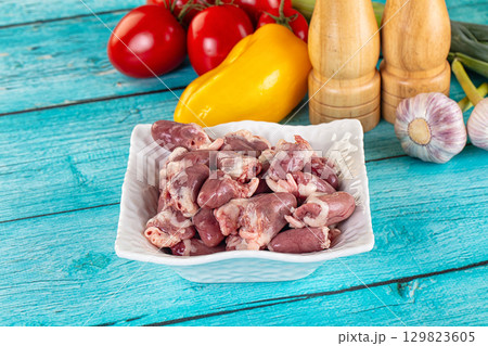 Raw chicken hearts for cooking 129823605