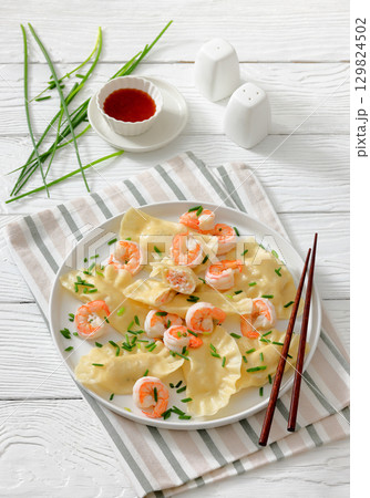 dim sum, chinese dumplings with shrimp filling 129824502