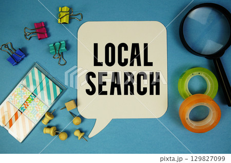 Local Search text with magnifying glass on blue background Local Search text with magnifying glass on blue background 129827099