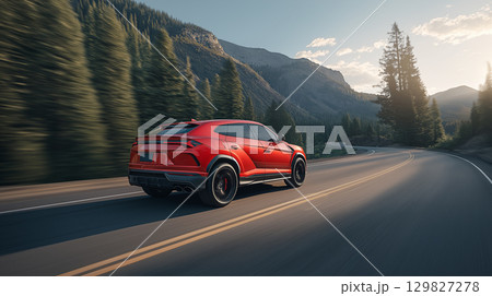 Red SUV ride through scenic mountains 129827278