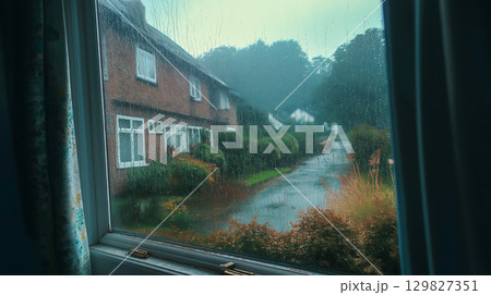 Rainy day view from the window on a quiet street 129827351