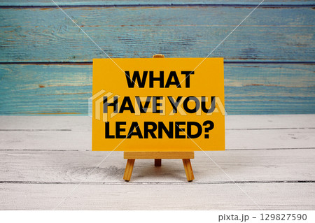 What Have You Learned? text written on paper card on wooden background What Have You Learned? text written on paper card on wooden background 129827590