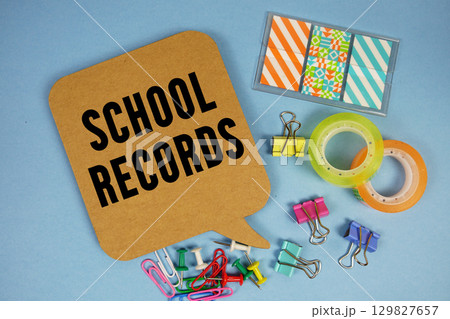 School Records text with stationery on blue background School Records text with stationery on blue background 129827657