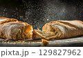 Freshly baked ciabatta on a dark background 129827962