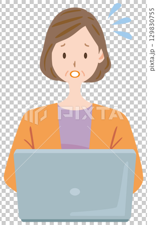 Middle-aged woman having trouble using a computer 129830755