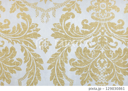 Luxurious Gold Damask Baroque Floral Pattern on White Background, Ornate Wallpaper Texture Luxurious Gold Damask Baroque Floral Pattern on White Background, Ornate Wallpaper Texture 129830861
