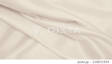 Smooth elegant golden silk or satin luxury cloth texture as wedding background. Luxurious background design. In Sepia toned. Retro style 129831934