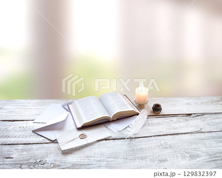Bible on white wooden table Bible on white wooden table 129832397