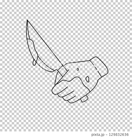 A knife is being held by a hand A knife is being held by a hand 129832636