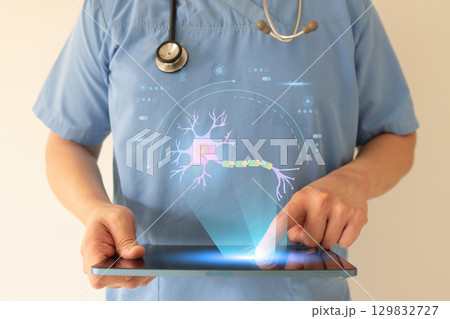 Neurologist studies and analyzes neuron structure hologram by digital tablet. Diagnosis and treatment of neurological disorders include MND, ALS, alzheimer disease and parkinson disease. 129832727