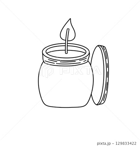 A jar with a candle inside and a leaf on top 129833422
