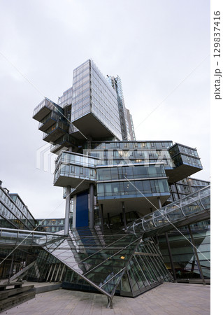 Modern glass skyscraper architecture in Hanover 129837416