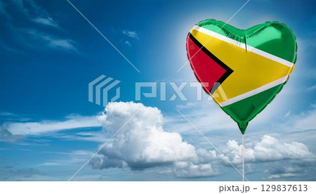 ガイアナの国旗のハート型の風船と青空 129837613