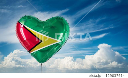 ガイアナの国旗のハート型の風船と青空 129837614