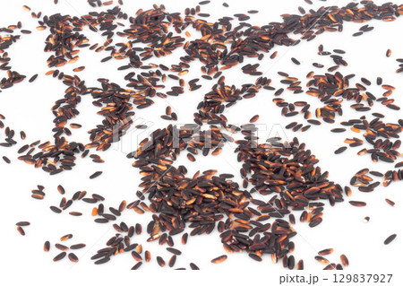 Black sticky rice spread splash isolated on white background 129837927