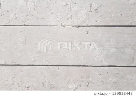 Old white painted exfoliate rustic bright light wooden texture. Wood background shabby 129838448