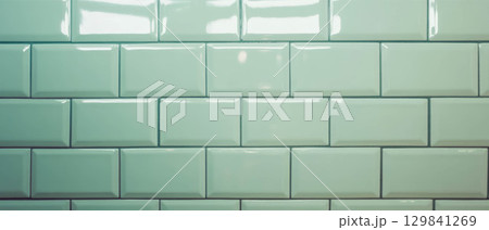 Cream subway tiles paired with dark grout create a classic and vintage aesthetic in interiors. 129841269