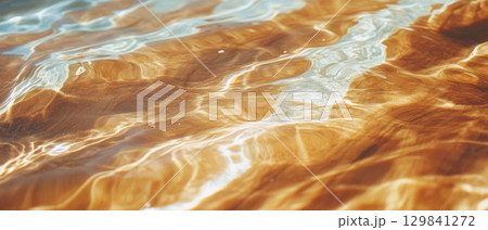 Natural elements blend seamlessly through a double exposure of wood grain and flowing water. Natural elements blend seamlessly through a double exposure of wood grain and flowing water. 129841272