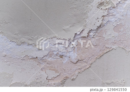 White cracked wall concrete background White cracked wall concrete background 129841550