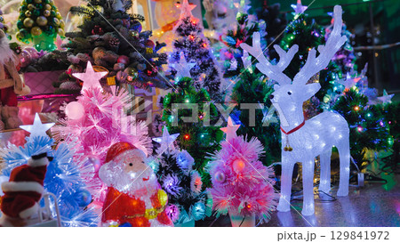 Christmas decorations glowing in the dark creating a festive atmosphere Christmas decorations glowing in the dark creating a festive atmosphere 129841972