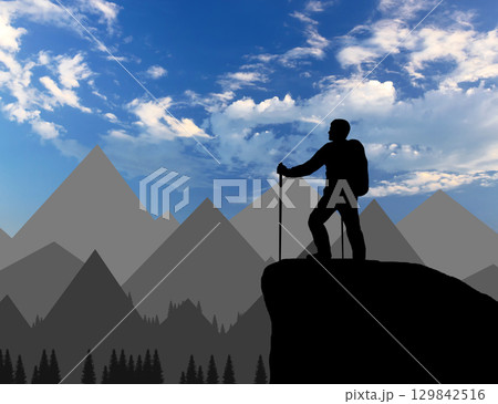 Silhouette of a climber on top looks into the distance over the mountains Silhouette of a climber on top looks into the distance over the mountains 129842516