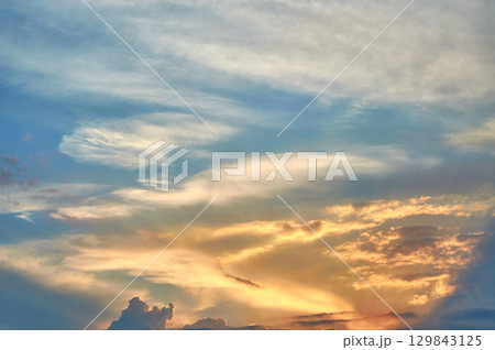 Cloud the evening sky at sunset Cloud the evening sky at sunset 129843125