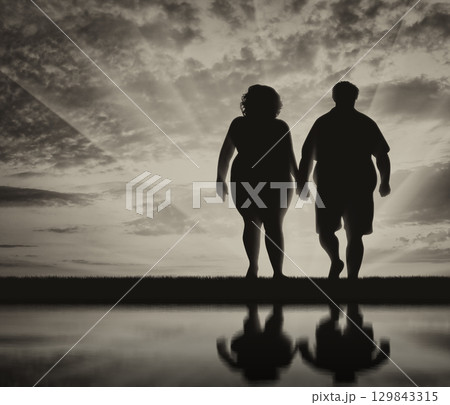 Silhouette thick pair sunset Silhouette thick pair sunset 129843315
