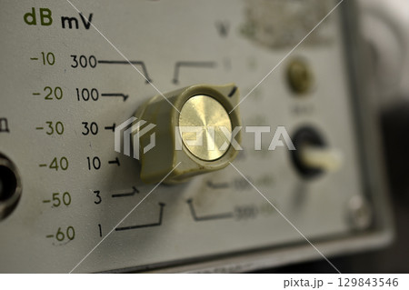 A millivoltmeter. Electronic devices. Voltage meter. An old electronic device. A millivoltmeter. Electronic devices. Voltage meter. An old electronic device. 129843546