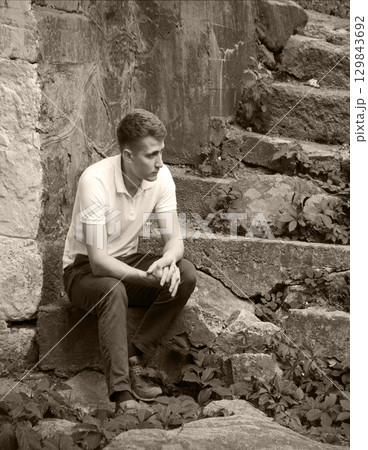 Sad man in the park Sad man in the park 129843692
