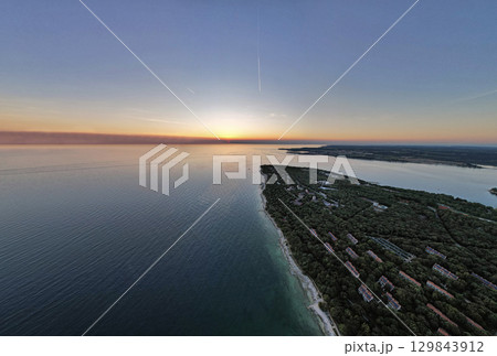 Aerial panorama drone sunset view of Lanterna peninsula, Istria, Croatia. Aerial panorama drone sunset view of Lanterna peninsula, Istria, Croatia. 129843912