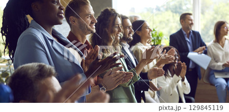 Diverse Business Team Applauding at Office Event 129845119