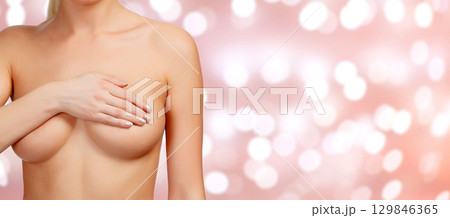 Breast cancer concept, abstract background with blurred lights Breast cancer concept, abstract background with blurred lights 129846365