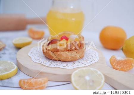 Tropical Fruit Dessert in Soft Pastel Setting 129850301