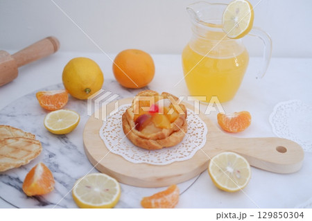 Tropical Fruit Dessert in Soft Pastel Setting 129850304