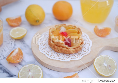 Tropical Fruit Dessert in Soft Pastel Setting 129850332