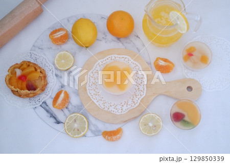 Tropical Fruit Dessert in Soft Pastel Setting Tropical Fruit Dessert in Soft Pastel Setting 129850339