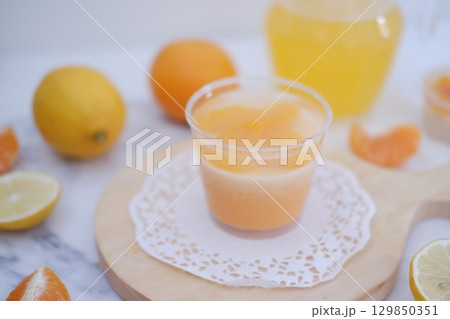 Tropical Fruit Dessert in Soft Pastel Setting 129850351
