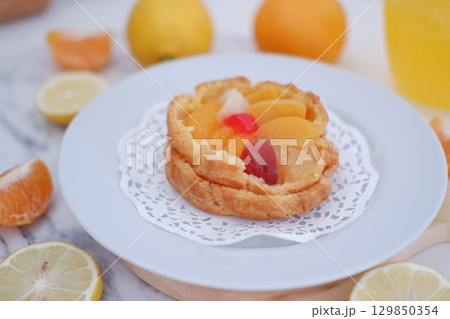 Tropical Fruit Dessert in Soft Pastel Setting 129850354