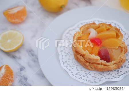 Tropical Fruit Dessert in Soft Pastel Setting Tropical Fruit Dessert in Soft Pastel Setting 129850364