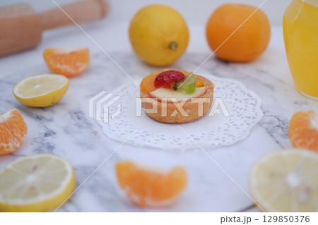 Tropical Fruit Dessert in Soft Pastel Setting 129850376