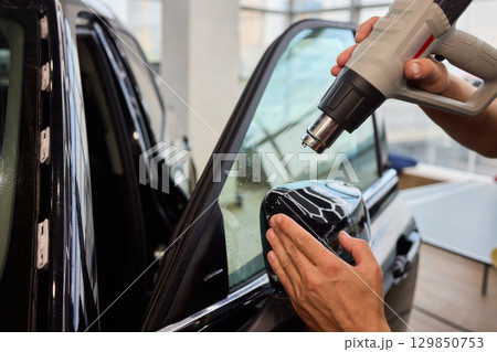 Mastering Automotive Detailing While Effectively Using a Hot Air Gun for Superior Results 129850753