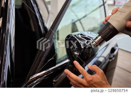 Mastering Automotive Detailing While Effectively Using a Hot Air Gun for Superior Results 129850754