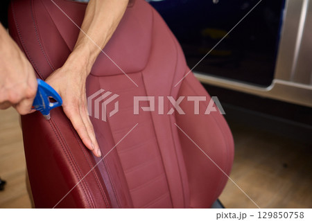 Detailing Leather Car Seats Requires the Use of Precision Tools for Best Results and Care 129850758