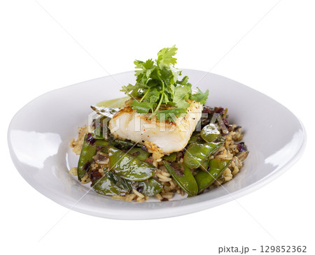 Cod Fish Fillets With Rice and Peas, isolated on white background 129852362
