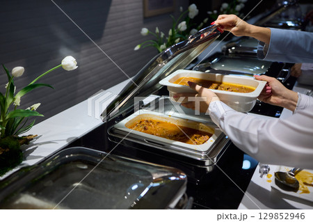 An Elegant Buffet Setup Featuring a Selection of Delicious Dishes Perfectly Served 129852946