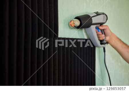 Applying Soundproof Foam Panels Securely Using a Hot Glue Gun for Better Performance and Insulation Applying Soundproof Foam Panels Securely Using a Hot Glue Gun for Better Performance and Insulation 129853057