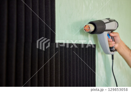 Applying Soundproof Foam Panels Securely Using a Hot Glue Gun for Better Performance and Insulation 129853058